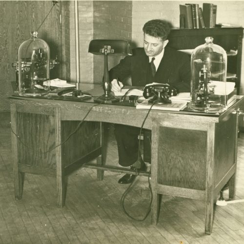 Dr. Shankweiler at his desk, circa 1930s